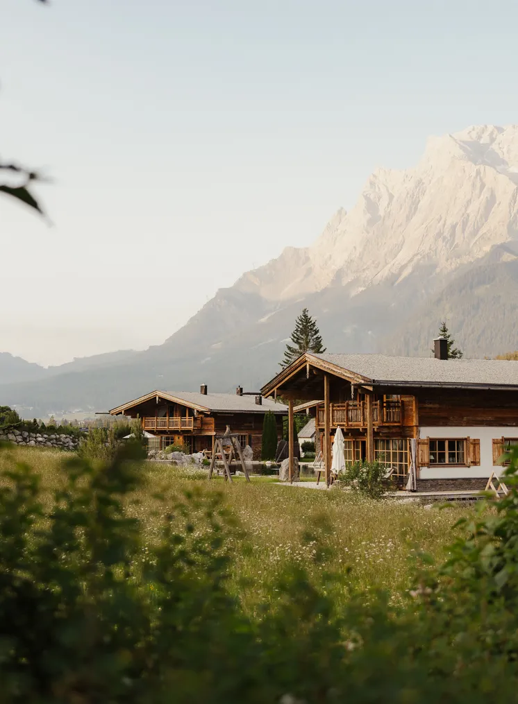 LaPosch Living Lands chalets in the alpine meadow with Zugspitze panorama